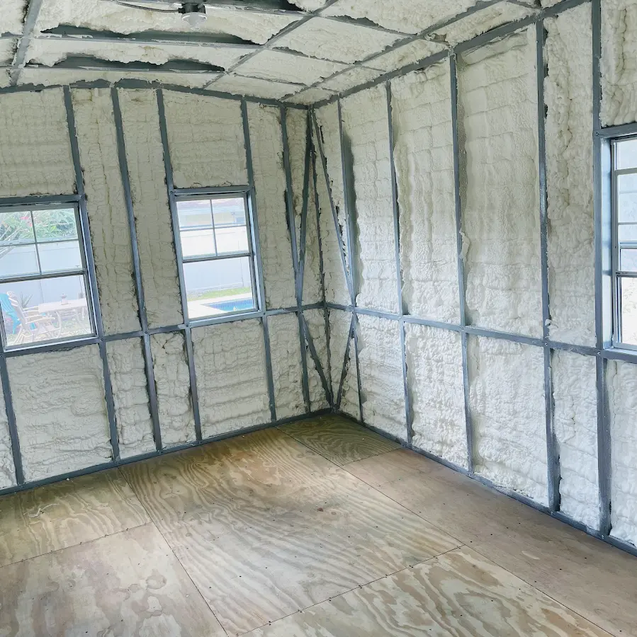 Closed-cell spray foam insulation applied to wall cavities in a residential project in Claremore